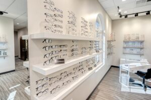 Shelves with eyeglass frames.